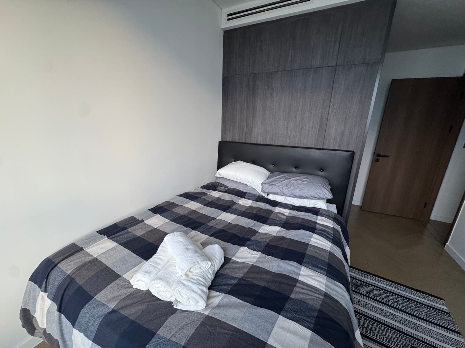 Master bedroom with queen bed