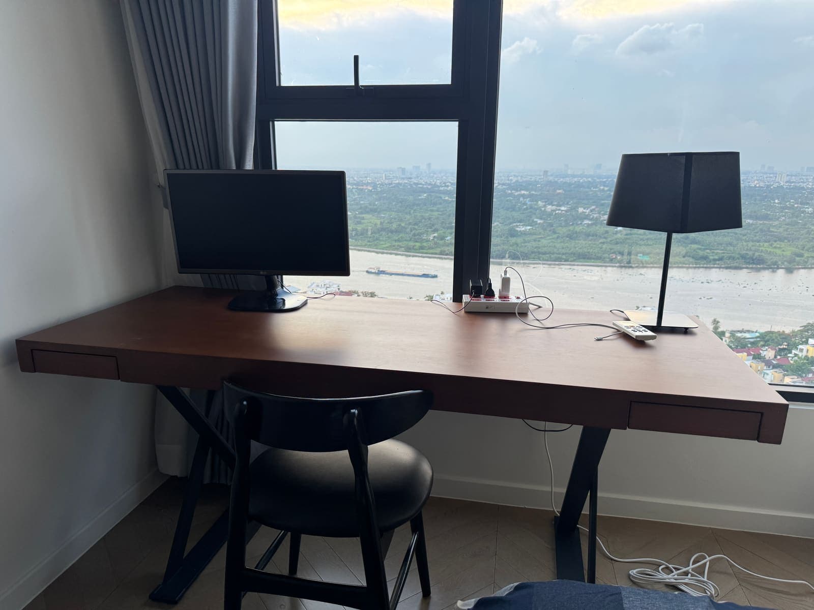 Dedicated workspace with monitor and river view